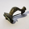 roman knee brooch